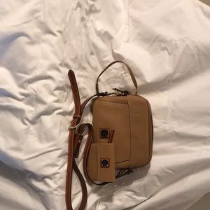 Dooney & Bourke Purse and matching Wallet.